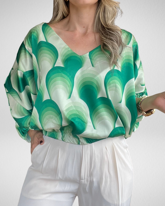 Blusón satín desigual