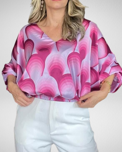 Blusón satín desigual